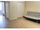 Bedroom with a sleeper sofa and ample closet space at 142 Winghurst Blvd, Orlando, FL 32828