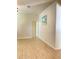 Light and airy hallway with wood flooring at 142 Winghurst Blvd, Orlando, FL 32828