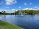 Serene lake view with fountain in a peaceful community at 142 Winghurst Blvd, Orlando, FL 32828