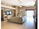 Bright living room featuring a neutral colored sectional sofa and built-in shelving at 142 Winghurst Blvd, Orlando, FL 32828