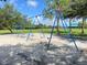 Row of blue swings at Freedom Park at 142 Winghurst Blvd, Orlando, FL 32828