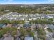 Aerial view of neighborhood with houses and trees at 1449 Ashdown Ct, Sanford, FL 32771