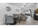 Cozy dining area with a table and chairs, adjacent to the living room at 1449 Ashdown Ct, Sanford, FL 32771