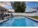 Inviting swimming pool with surrounding patio at 1449 Ashdown Ct, Sanford, FL 32771