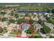 Aerial view showcasing a house's curb appeal and neighborhood at 148 Calliope St, Ocoee, FL 34761