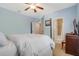 Bedroom with a comfortable bed and an ensuite bathroom at 148 Calliope St, Ocoee, FL 34761