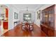 Formal dining room with hardwood floors and a wooden hutch at 148 Calliope St, Ocoee, FL 34761