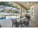 Relaxing patio with pool view and seating area at 148 Calliope St, Ocoee, FL 34761