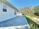 Back patio with pavers and exterior door at 1480 Battle St, Oviedo, FL 32765