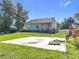 Spacious backyard with a large concrete slab, perfect for a pool or patio at 1480 Battle St, Oviedo, FL 32765