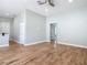 Spacious living room with wood-look tile floors at 1480 Battle St, Oviedo, FL 32765