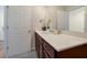 Clean bathroom with vanity, sink, and shower at 1552 Carey Palm Cir, Kissimmee, FL 34747