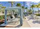 Private cabanas with lounge chairs and shade at 1552 Carey Palm Cir, Kissimmee, FL 34747