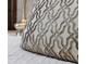 Close up of a gray patterned throw pillow at 1552 Carey Palm Cir, Kissimmee, FL 34747