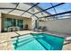 Private pool and patio area with covered lanai at 1552 Carey Palm Cir, Kissimmee, FL 34747