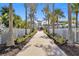 Landscaped walkway leading to the resort amenities at 1552 Carey Palm Cir, Kissimmee, FL 34747