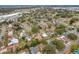 Aerial view of a suburban neighborhood with houses and trees at 1630 Smithfield E Cir, Lakeland, FL 33801