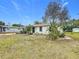 Charming house with a spacious yard and mature tree at 1630 Smithfield E Cir, Lakeland, FL 33801