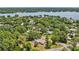 Aerial view of lakefront home and neighborhood at 1638 Frances Dr, Apopka, FL 32703