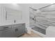 Modern bathroom with grey vanity and marble shower at 1638 Frances Dr, Apopka, FL 32703