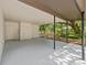 Covered carport with concrete flooring at 1638 Frances Dr, Apopka, FL 32703