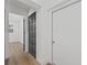 Clean hallway with light walls and gray doors at 1638 Frances Dr, Apopka, FL 32703