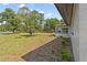 Side view of the house showcasing landscaping at 1638 Frances Dr, Apopka, FL 32703