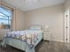 Charming bedroom with a comfy bed and window at 17608 Sailfin Dr, Orlando, FL 32820