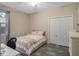 Bright bedroom with a comfortable bed and plenty of natural light at 17608 Sailfin Dr, Orlando, FL 32820