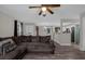 Living room with gray sectional sofa and hardwood floors at 1783 Flores Ct, Orlando, FL 32811