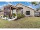 Private backyard oasis with pergola, stone patio, and lush landscaping at 2368 Monaco Cove Cir, Orlando, FL 32825