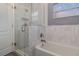 Updated bathroom with a large shower and soaking tub at 2368 Monaco Cove Cir, Orlando, FL 32825