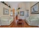 Living room with hardwood floors and beige couches at 2368 Monaco Cove Cir, Orlando, FL 32825