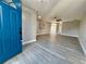 Bright and spacious entryway with gray wood-look flooring at 2413 Rock Ct, Poinciana, FL 34759