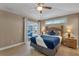 Bright bedroom with sliding door access to the patio at 2661 Emerald Island Blvd, Kissimmee, FL 34747