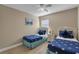 Twin bedroom with nautical-themed bedding at 2661 Emerald Island Blvd, Kissimmee, FL 34747