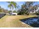 Large backyard with grassy area and detached structure at 280 E Constance Rd, Debary, FL 32713