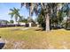 Large backyard with a shed or garage and plenty of mature trees at 280 E Constance Rd, Debary, FL 32713