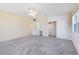 Spacious bedroom with carpet flooring, ceiling fan, and built-in vanity at 280 E Constance Rd, Debary, FL 32713