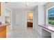 Spacious eat-in area featuring a built-in desk and plentiful storage at 280 E Constance Rd, Debary, FL 32713