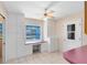 Eat-in area with large windows, ceiling fan, and built-in desk at 280 E Constance Rd, Debary, FL 32713