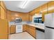 Charming kitchen with stainless steel appliances and abundant wooden cabinetry at 280 E Constance Rd, Debary, FL 32713