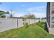 Neatly landscaped backyard with a privacy fence at 2950 Sonata Ct, Saint Cloud, FL 34772