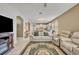 Living room with open concept layout, offering views of the kitchen and comfortable seating at 2950 Sonata Ct, Saint Cloud, FL 34772