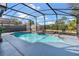 Inviting screened pool with a spacious deck at 2988 Stillwater Dr, Kissimmee, FL 34743