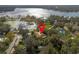 Aerial view of the property's location near a lake at 332 Lake Winnemissett Dr, Deland, FL 32724