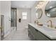 Modern bathroom with double vanity and walk-in shower at 332 Lake Winnemissett Dr, Deland, FL 32724