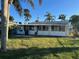 Spacious backyard with a large screened enclosure at 335 Brookline Ave, Daytona Beach, FL 32118