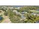 Aerial view of community with golf course and lake at 3513 Pinetree Rd, Orlando, FL 32804