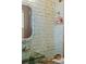 Powder room with a glass-tile feature wall and vessel sink at 3513 Pinetree Rd, Orlando, FL 32804